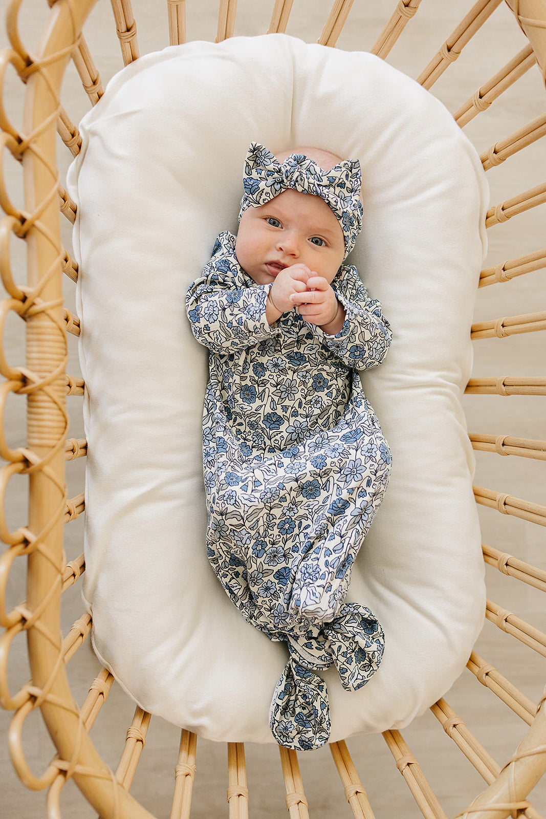 Infant bow headband featuring allover floral print