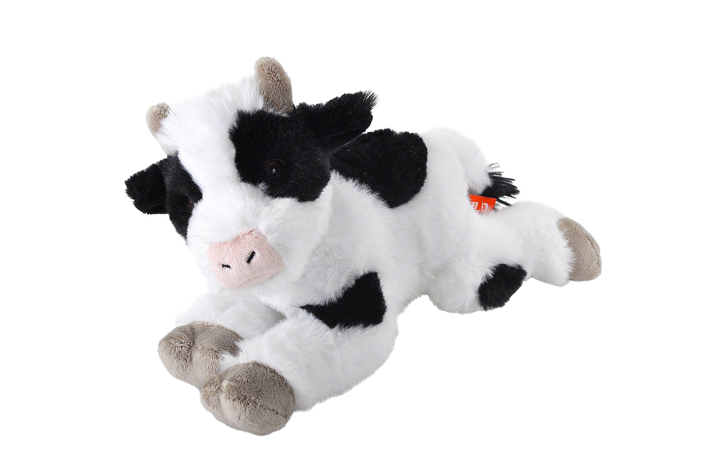 Plush cow toy on a white background