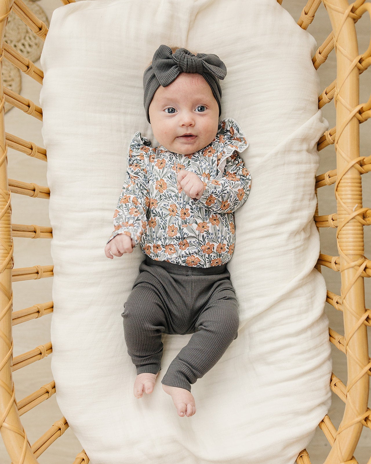 Floral Meadow long sleeve onesie with ruffles at the top of the sleeves