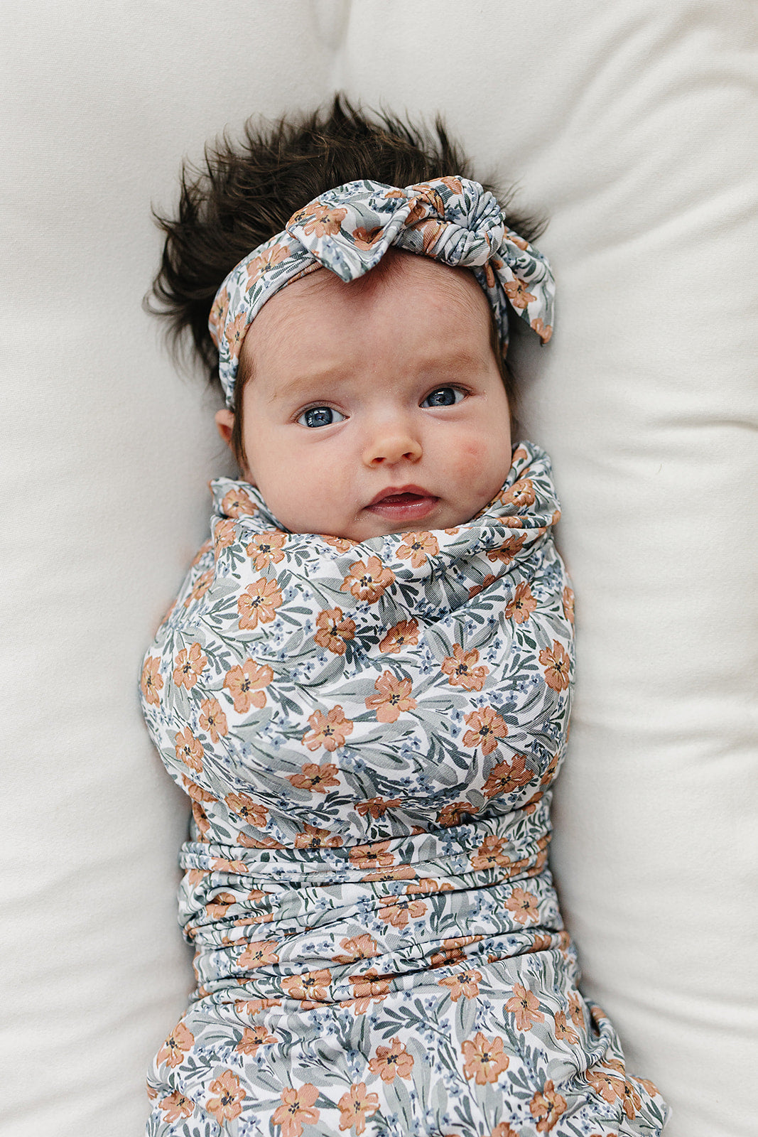 Navy floral bamboo swaddle for baby girls