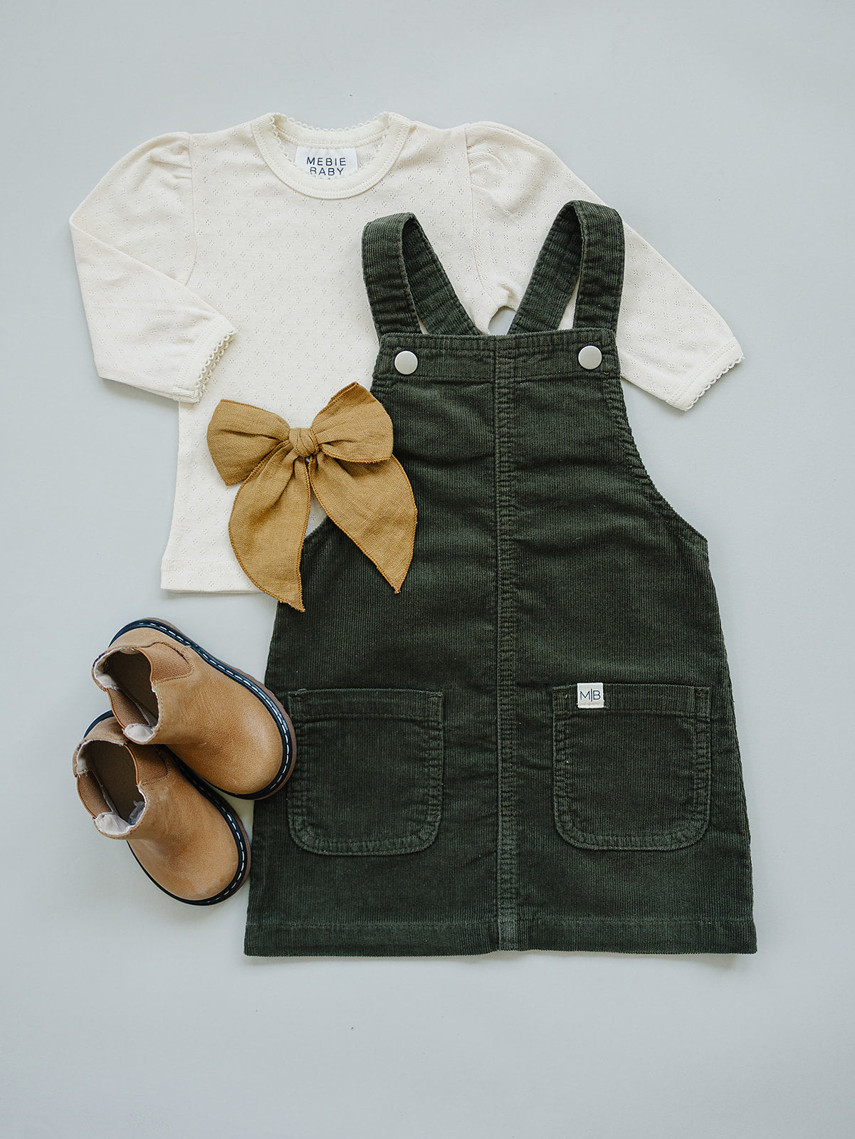 Soft corduroy overall dress for babies and toddlers