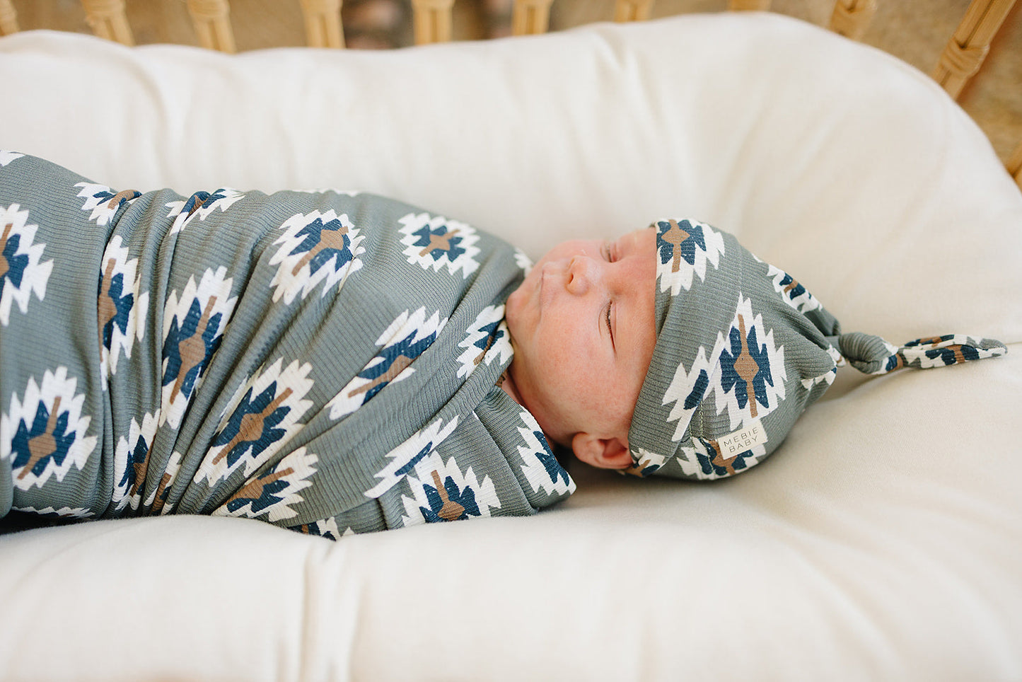 Gender neutral baby swaddle with modern tribal design by Mebie Baby