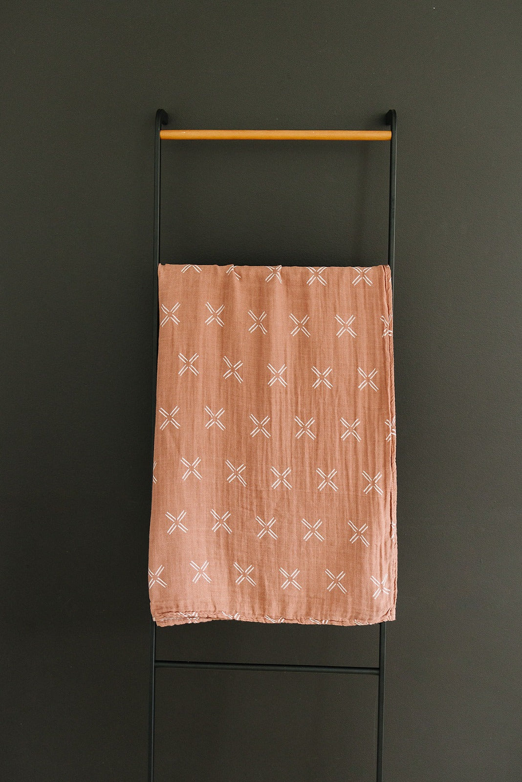 Peach muslin swaddle blanket for baby girl