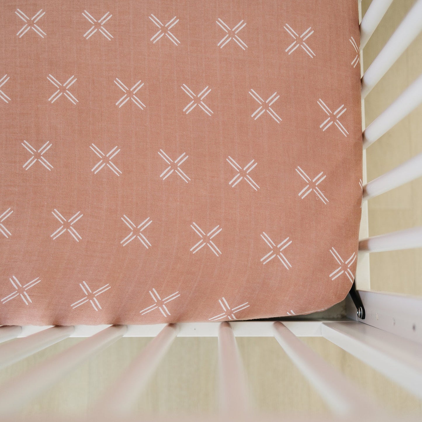 Peach crib sheet for baby girls nursery