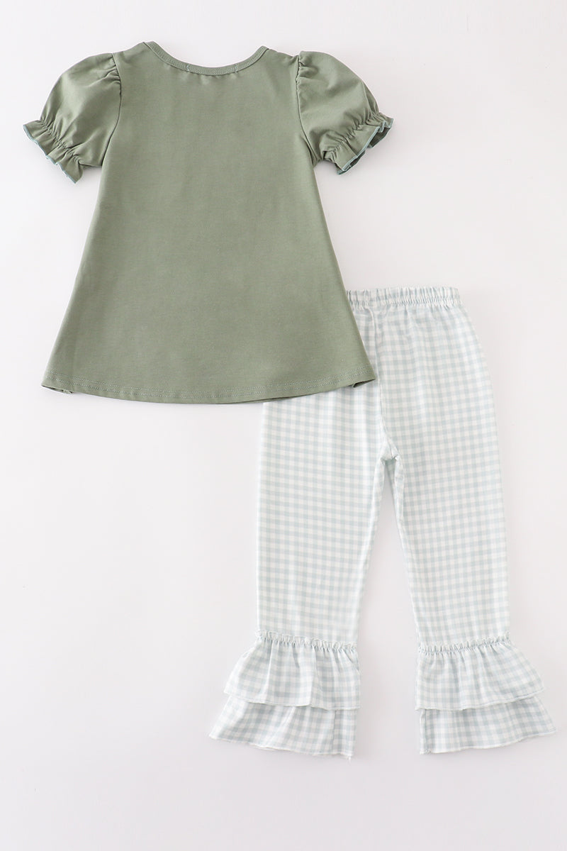 Fall toddler outfit with olive pumpkin top and gingham ruffle pants