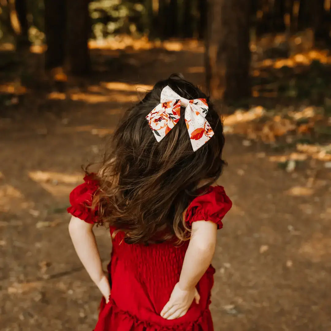 Western horseshoe bow clip with floral print on neutral fabric, lightweight hair bow for girls