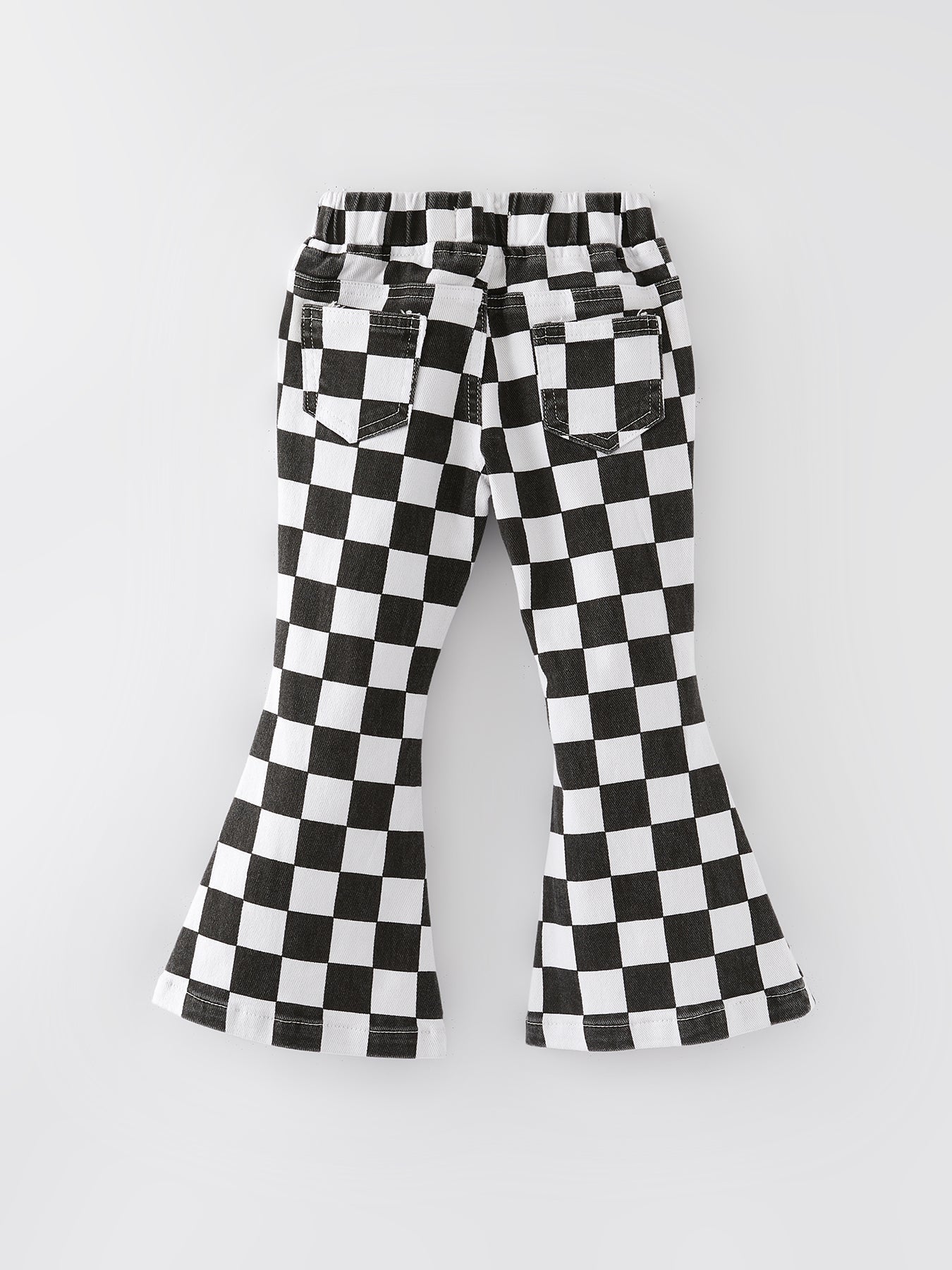 Black and white checkered bell-bottom pants on a light gray background