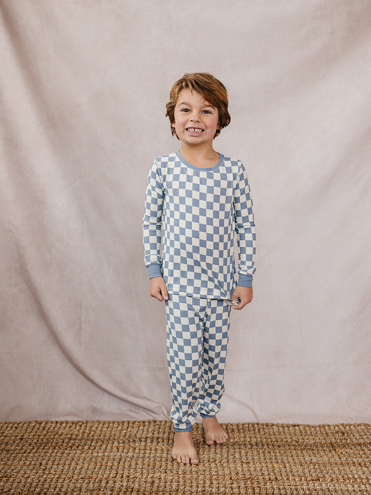 Soft bamboo lounge set for kids in blue checkered print, breathable and stretchy outfit for toddlers and children