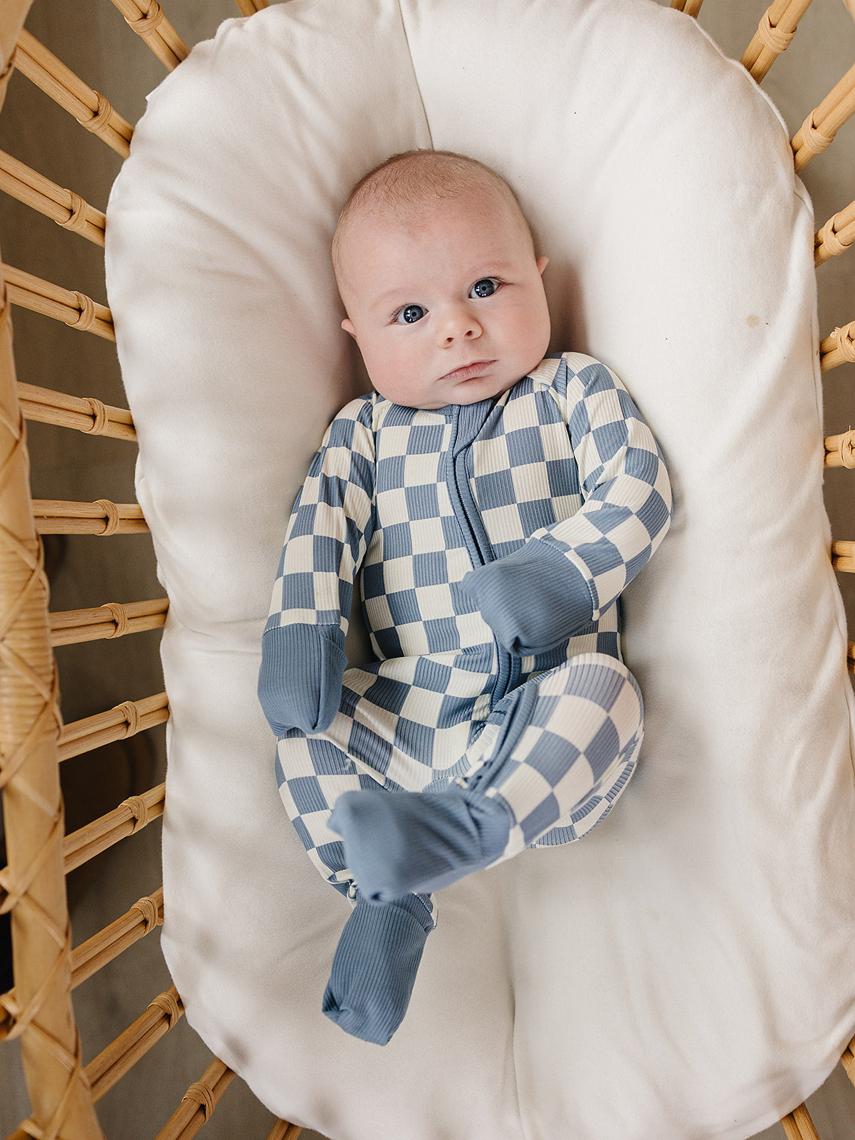 Blue checkered bamboo baby sleeper with foot cuffs, cozy and stretchy for growing babies
