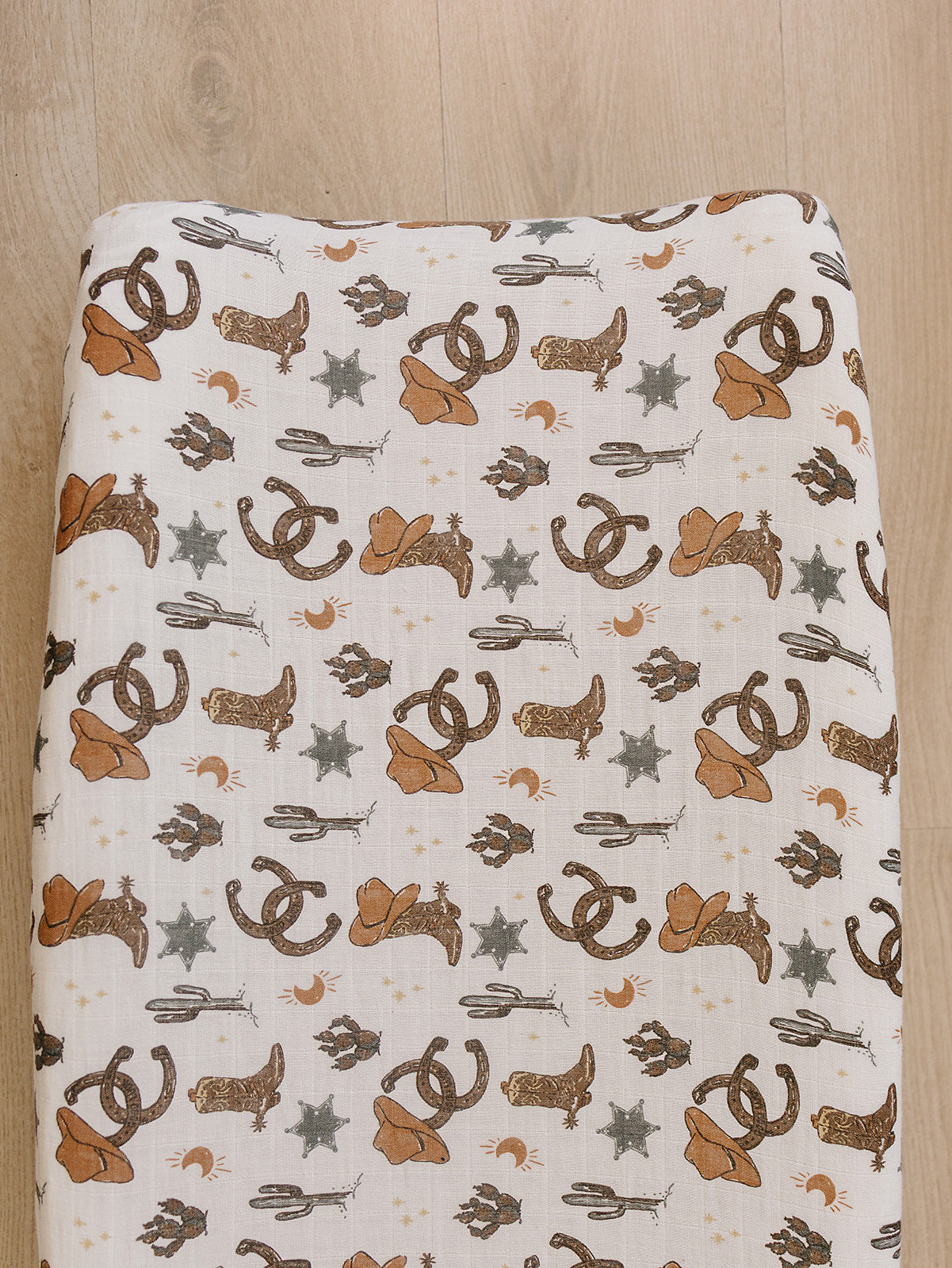Cowboy themed muslin changing pad cover for western nursery 