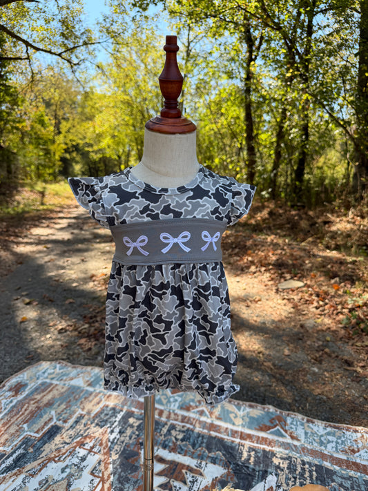 Girls gray camouflage bubble romper with flutter sleeves and white embroidered bow details