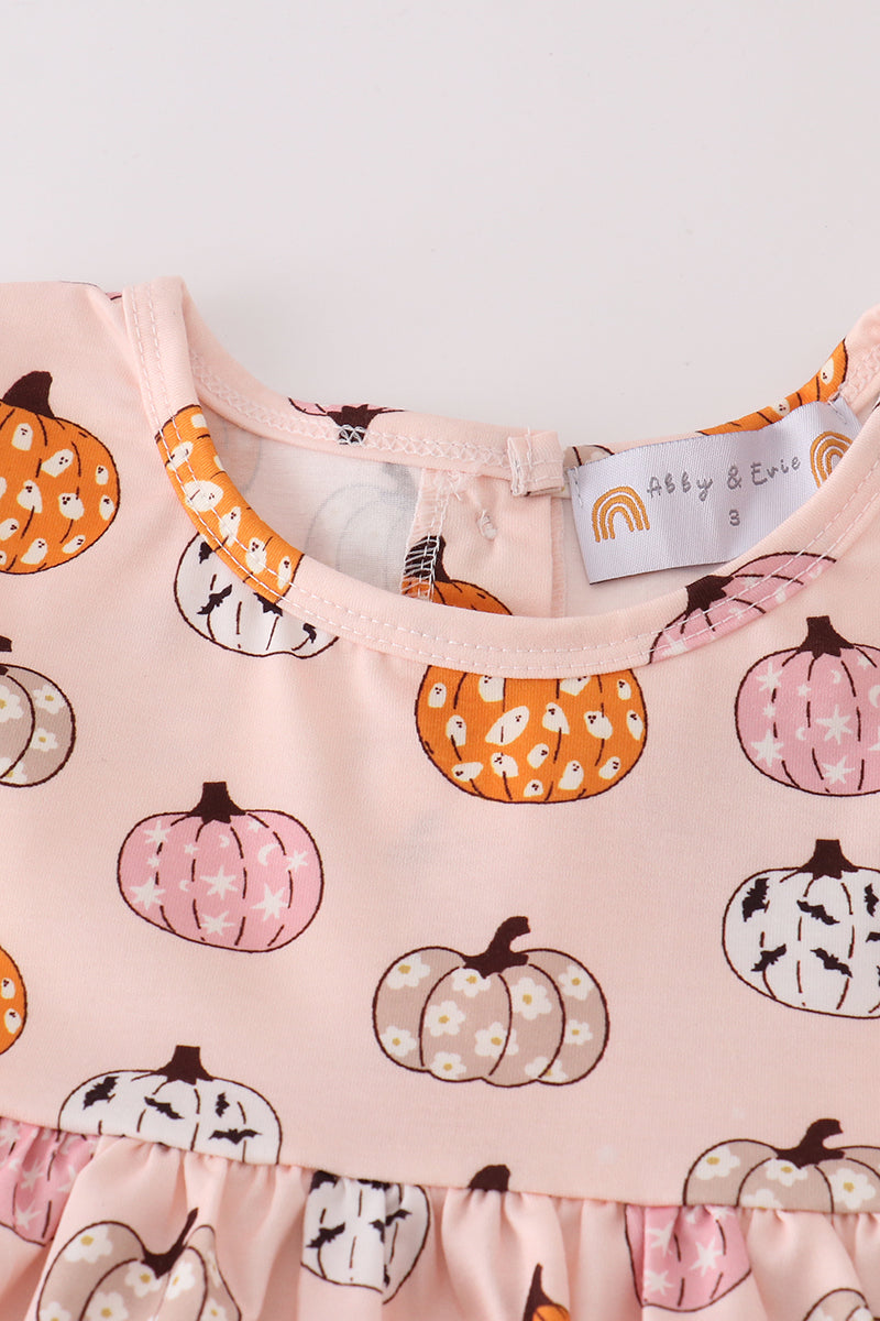 Toddler girl Halloween outfit with pumpkin print tunic and orange polka dot ruffle pants