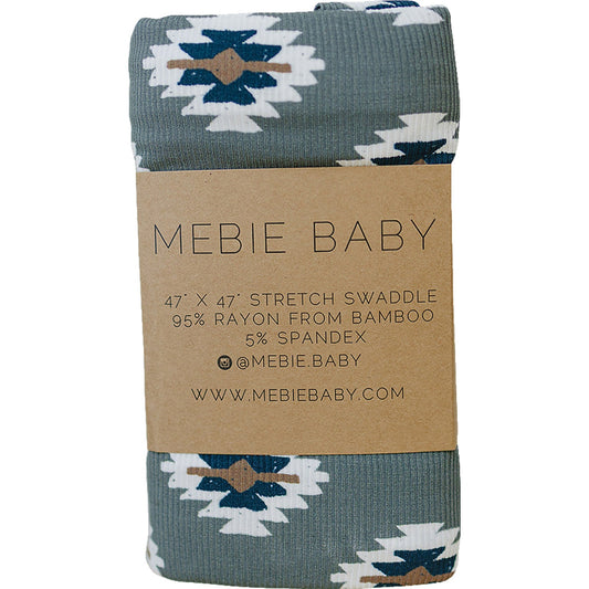 Mebie Baby stretch swaddle in sage green with southwestern geometric print