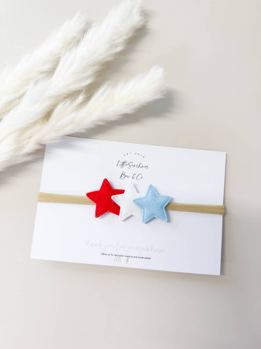 Red white and blue star infant headband on soft nude nylon band for baby