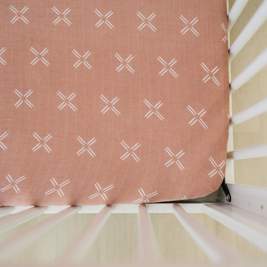 Peach crib sheet for baby girls nursery 