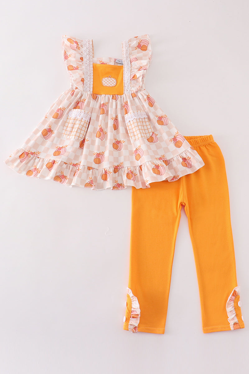 Toddler girl fall boutique outfit with gingham pumpkin top and orange leggings