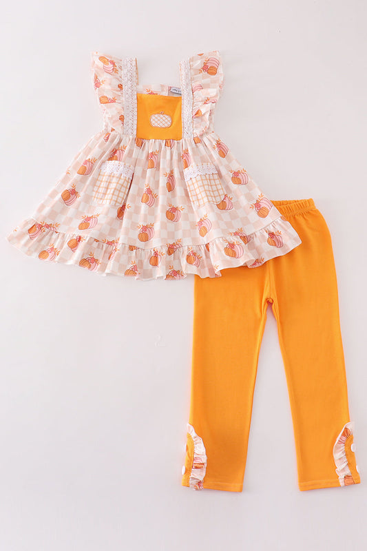 Toddler girl fall boutique outfit with gingham pumpkin top and orange leggings