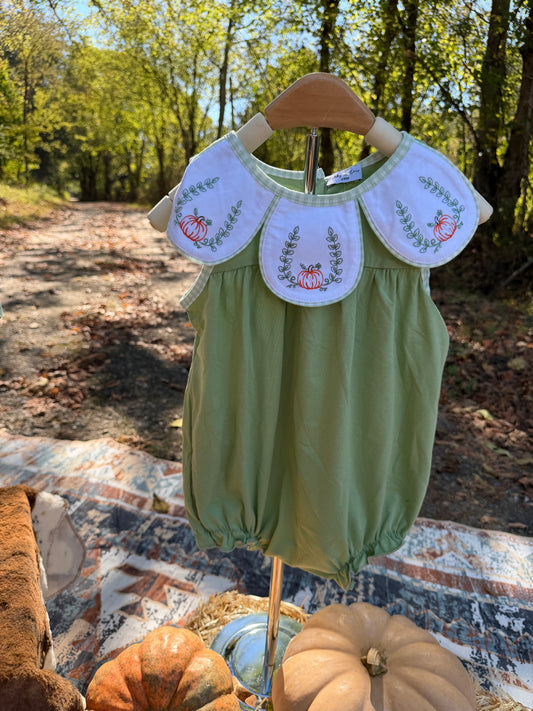 Baby girl fall bubble featuring embroidered pumpkins and green leafy details