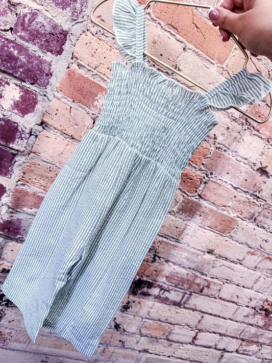 Sage green seersucker smocked jumpsuit for girls with ruffle straps